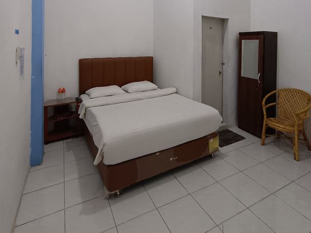 Imagen de la habitación del Hotel OYO 92207 Koperasi. Foto 7