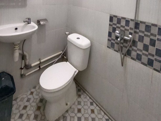 Imagen de la habitación del Hotel OYO 92207 Koperasi. Foto 8