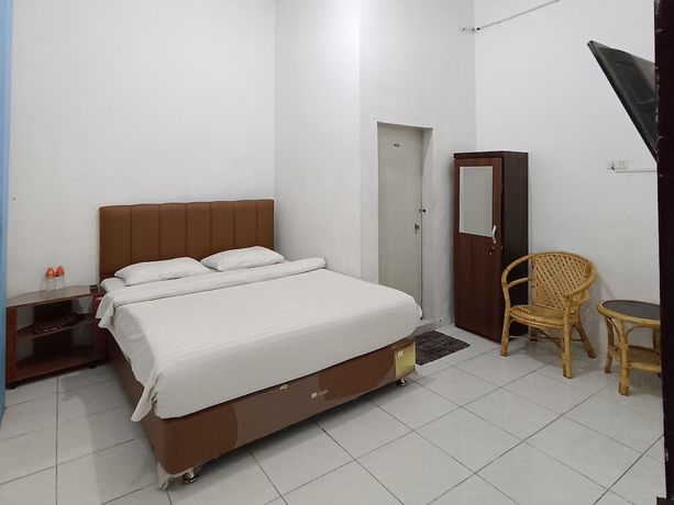 Imagen de la habitación del Hotel OYO 92207 Koperasi. Foto 11