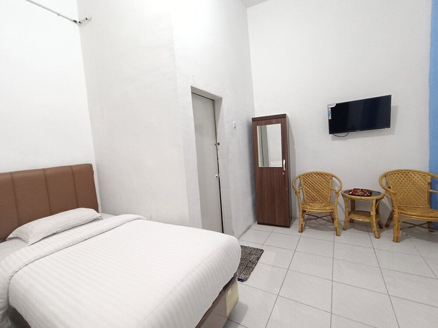 Imagen de la habitación del Hotel OYO 92207 Koperasi. Foto 14