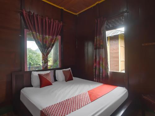 Imagen de la habitación del Hotel OYO 92225 Filadelfia Resto & Penginapan. Foto 19