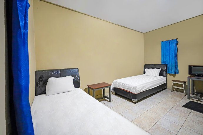 Imagen de la habitación del Hotel OYO 92230 Penginapan Metro Parepare. Foto 7