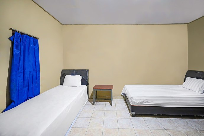 Imagen de la habitación del Hotel OYO 92230 Penginapan Metro Parepare. Foto 10
