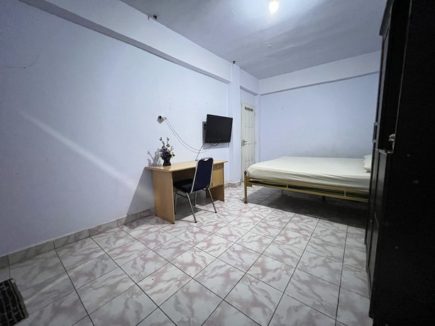 Imagen de la habitación del Hotel OYO 92234 Mattampa Inn Syariah. Foto 3
