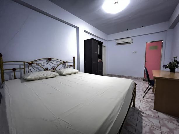 Imagen de la habitación del Hotel OYO 92234 Mattampa Inn Syariah. Foto 6