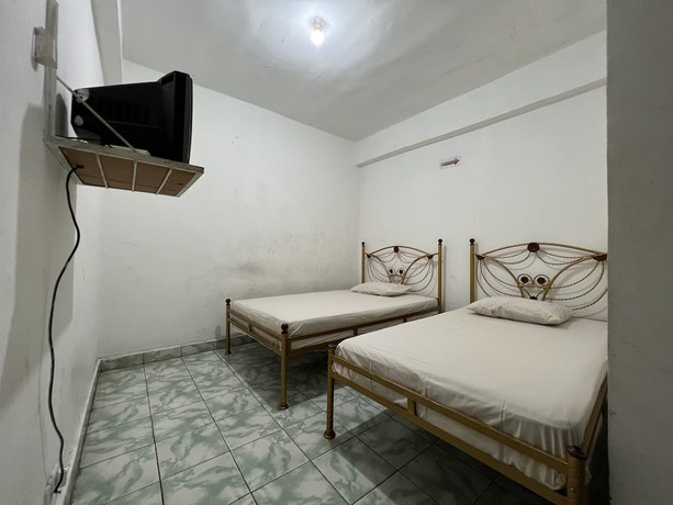Imagen de la habitación del Hotel OYO 92234 Mattampa Inn Syariah. Foto 9