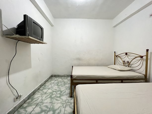 Imagen de la habitación del Hotel OYO 92234 Mattampa Inn Syariah. Foto 11