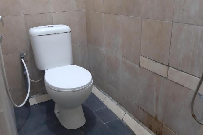 Imagen de la habitación del Hotel OYO 92243 Fanilly Guest House Marabahan. Foto 2