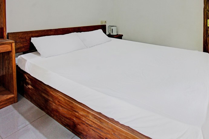 Imagen de la habitación del Hotel OYO 92275 Tastura Homestay. Foto 8