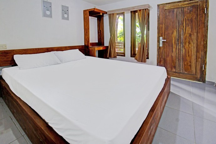 Imagen de la habitación del Hotel OYO 92275 Tastura Homestay. Foto 9