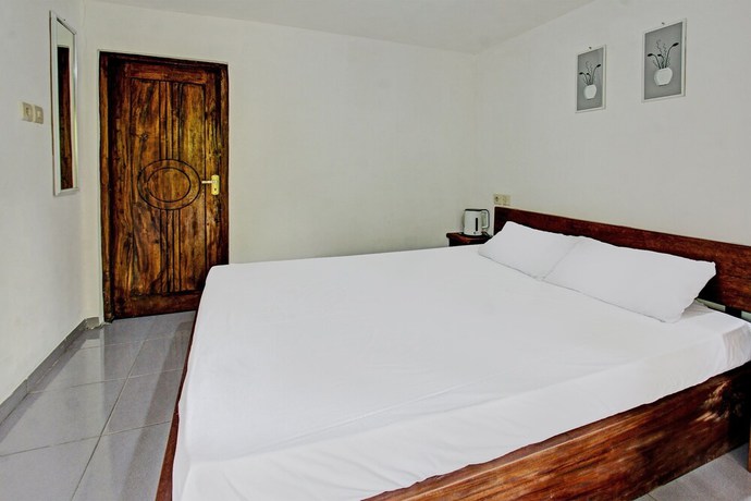 Imagen de la habitación del Hotel OYO 92275 Tastura Homestay. Foto 10