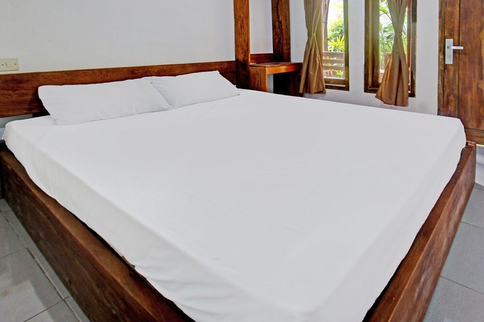 Imagen de la habitación del Hotel OYO 92275 Tastura Homestay. Foto 12