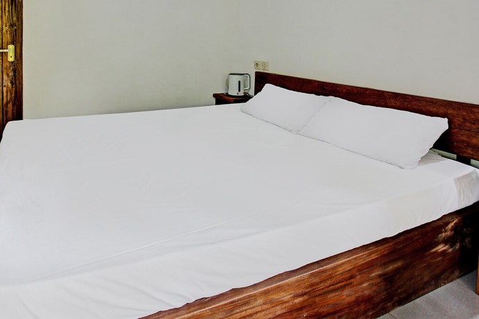 Imagen de la habitación del Hotel OYO 92275 Tastura Homestay. Foto 14