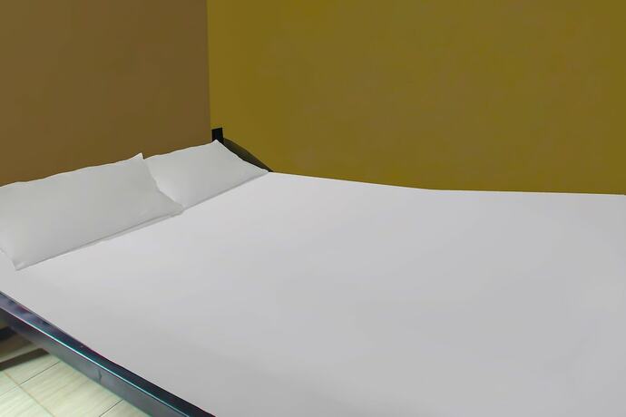 Imagen de la habitación del Hotel OYO 92308 Kos Duduk. Foto 17