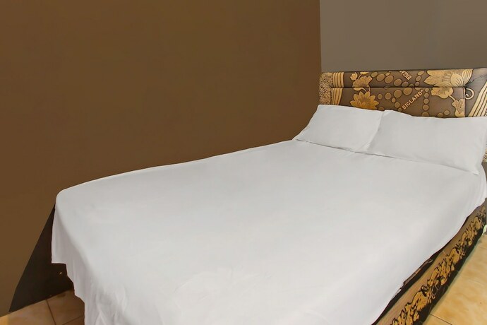 Imagen de la habitación del Hotel OYO 92308 Kos Duduk. Foto 18