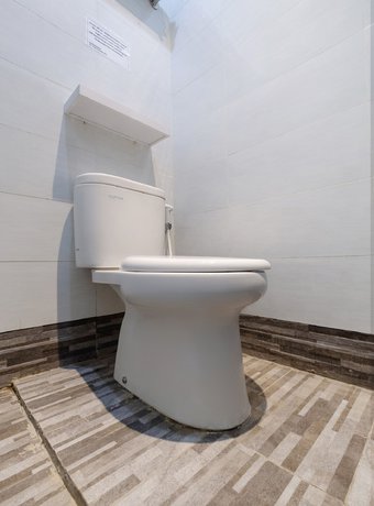 Imagen de la habitación del Hotel OYO 92325 Penginapan Fajar Syariah. Foto 5