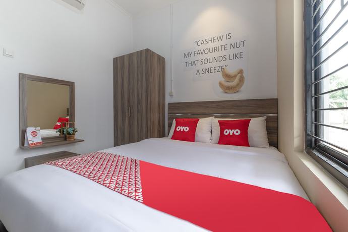 Imagen de la habitación del Hotel OYO 92325 Penginapan Fajar Syariah. Foto 10