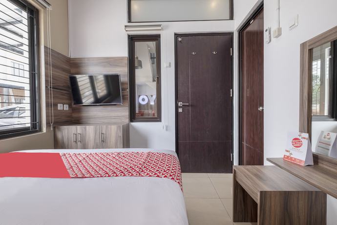 Imagen de la habitación del Hotel OYO 92325 Penginapan Fajar Syariah. Foto 11