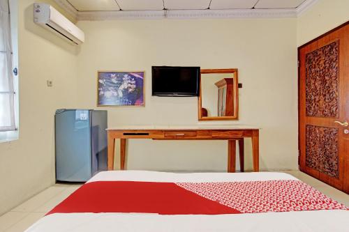 Imagen de la habitación del Hotel OYO 92329 Sewu Mas, Sleman. Foto 20