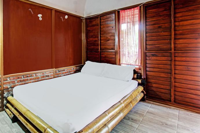 Imagen de la habitación del Hotel OYO 92354 Samalas Syariah Homestay. Foto 2