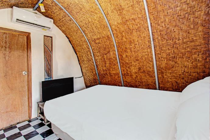 Imagen de la habitación del Hotel OYO 92354 Samalas Syariah Homestay. Foto 4