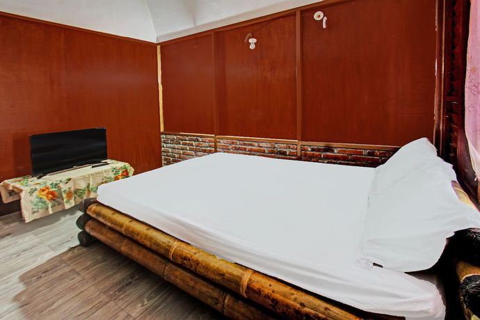 Imagen de la habitación del Hotel OYO 92354 Samalas Syariah Homestay. Foto 6