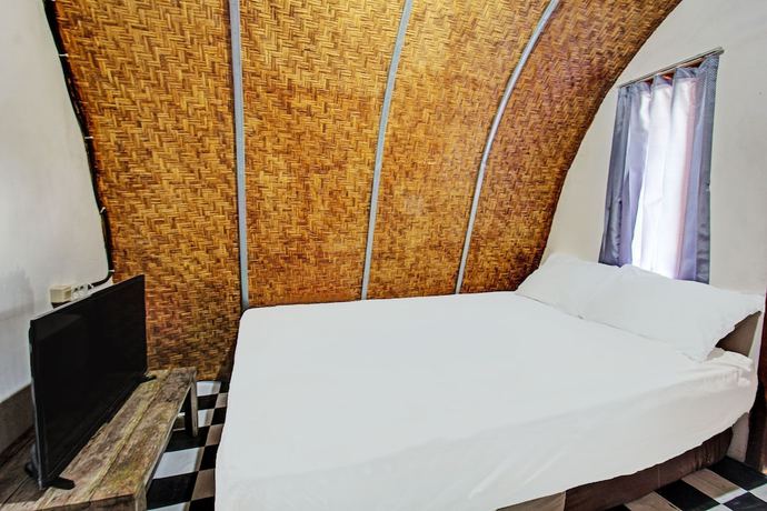 Imagen de la habitación del Hotel OYO 92354 Samalas Syariah Homestay. Foto 7