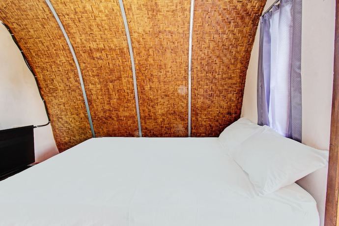 Imagen de la habitación del Hotel OYO 92354 Samalas Syariah Homestay. Foto 9