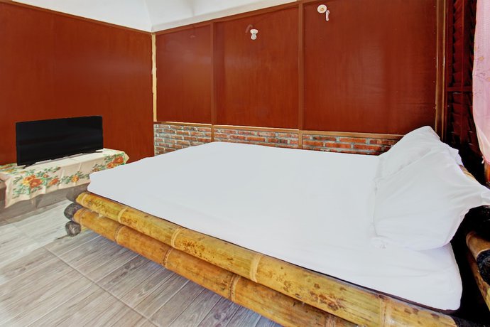 Imagen de la habitación del Hotel OYO 92354 Samalas Syariah Homestay. Foto 12