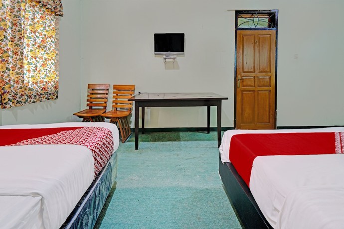 Imagen de la habitación del Hotel OYO 92431 Grand Bintang Guest House. Foto 6