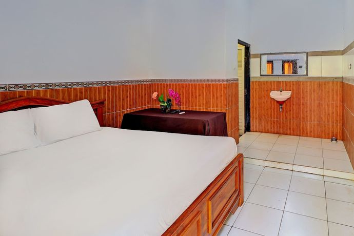 Imagen de la habitación del Hotel OYO 92438 Nugraha Stay Near Sangeh Monkey Forest. Foto 11