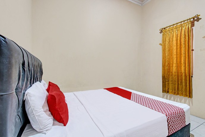 Imagen de la habitación del Hotel OYO 92459 Cahyo Kost 2. Foto 10