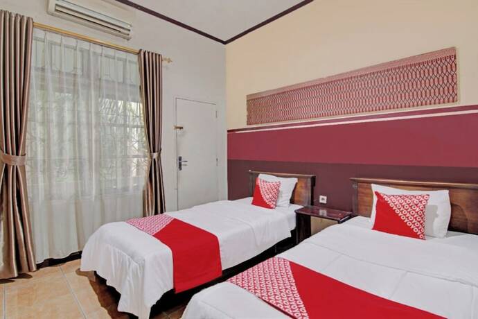 Imagen de la habitación del Hotel OYO 92502 Penginapan Rokan Permai Syariah. Foto 20