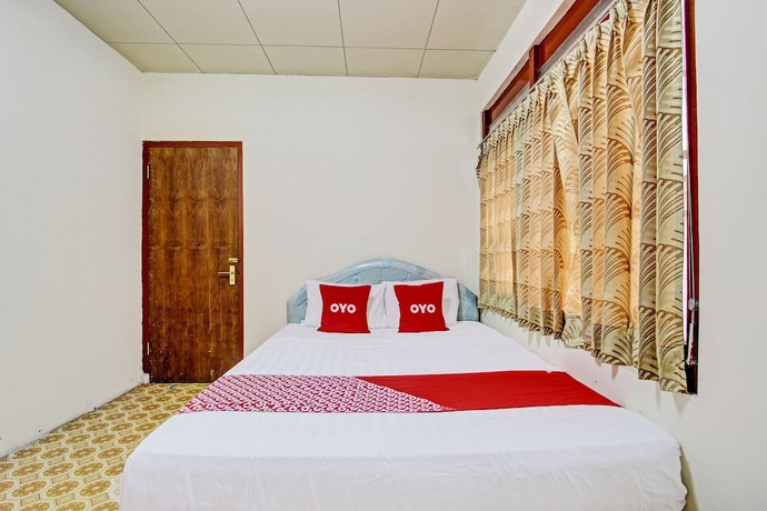 Imagen de la habitación del Hotel OYO 92505 Asta Guesthouse. Foto 2