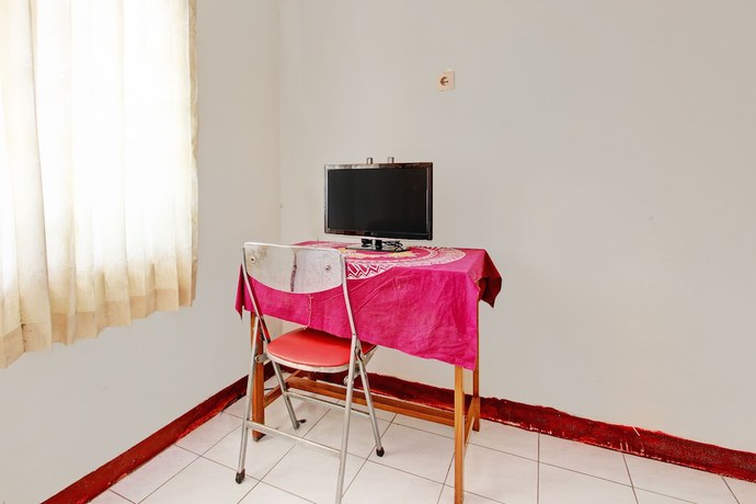Imagen de la habitación del Hotel OYO 92505 Asta Guesthouse. Foto 7
