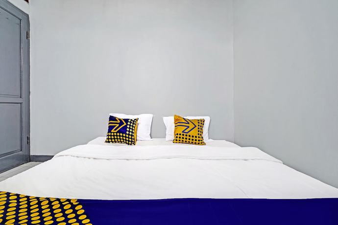 Imagen de la habitación del Hotel OYO 92512 Atlanta Guesthouse. Foto 1