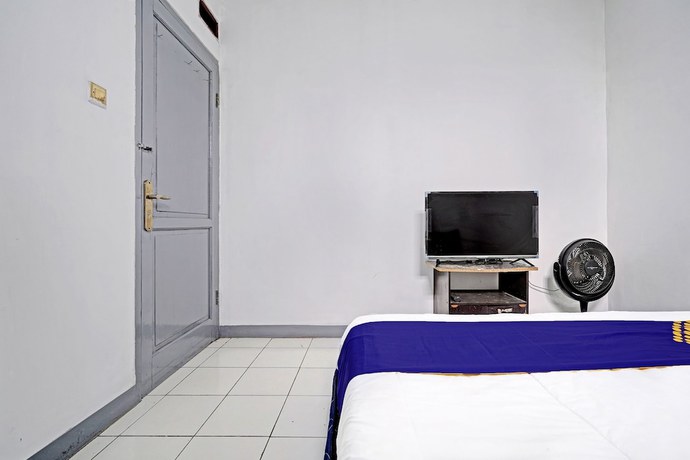Imagen de la habitación del Hotel OYO 92512 Atlanta Guesthouse. Foto 5