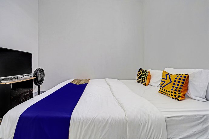 Imagen de la habitación del Hotel OYO 92512 Atlanta Guesthouse. Foto 6