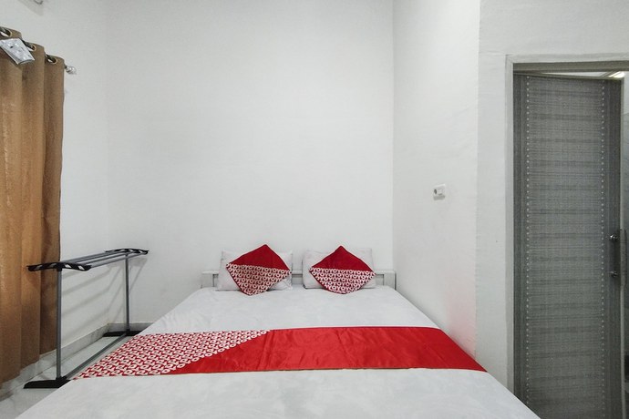 Imagen de la habitación del Hotel OYO 92522 Gle Kost Syariah. Foto 2
