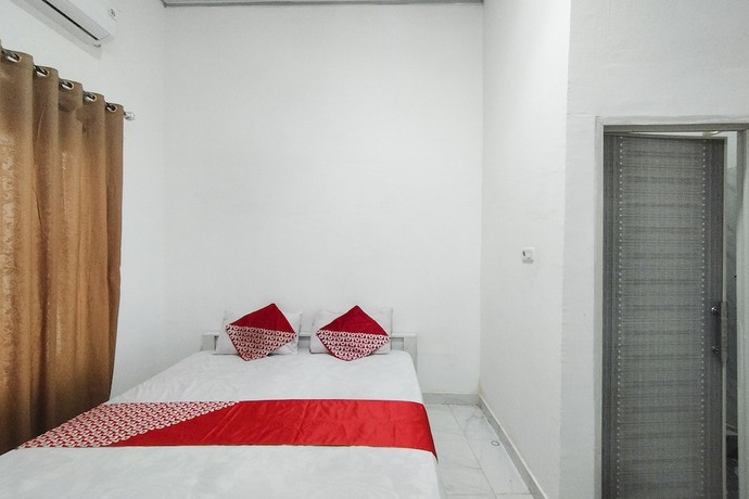 Imagen de la habitación del Hotel OYO 92522 Gle Kost Syariah. Foto 6