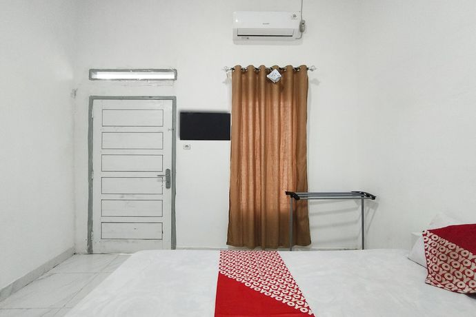Imagen de la habitación del Hotel OYO 92522 Gle Kost Syariah. Foto 9