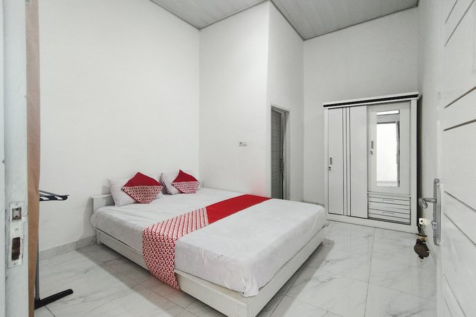 Imagen de la habitación del Hotel OYO 92522 Gle Kost Syariah. Foto 14