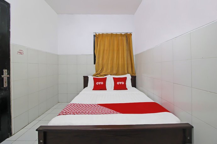 Imagen de la habitación del Hotel OYO 92533 Harjuna Guest House. Foto 3
