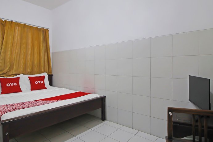 Imagen de la habitación del Hotel OYO 92533 Harjuna Guest House. Foto 5