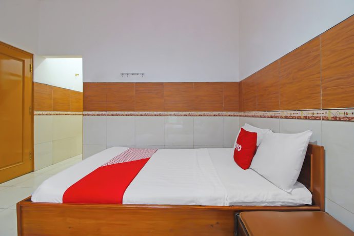 Imagen de la habitación del Hotel OYO 92533 Harjuna Guest House. Foto 9