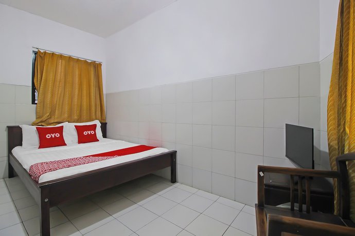 Imagen de la habitación del Hotel OYO 92533 Harjuna Guest House. Foto 11