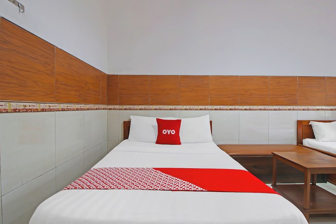 Imagen de la habitación del Hotel OYO 92533 Harjuna Guest House. Foto 12