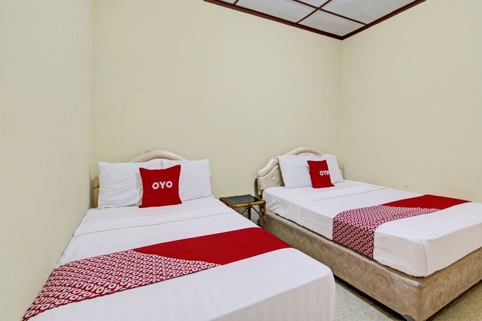 Imagen de la habitación del Hotel OYO 92534 Fajar Indah Guest House. Foto 8
