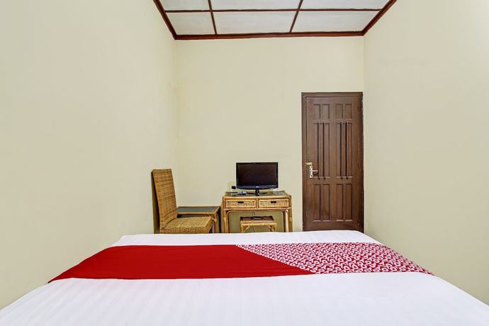 Imagen de la habitación del Hotel OYO 92534 Fajar Indah Guest House. Foto 10