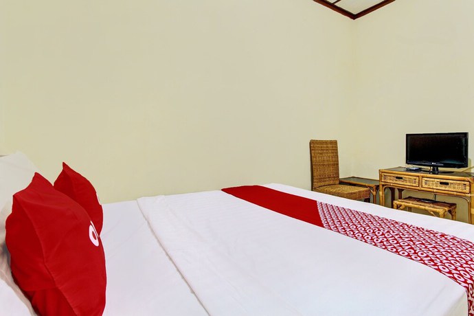 Imagen de la habitación del Hotel OYO 92534 Fajar Indah Guest House. Foto 11